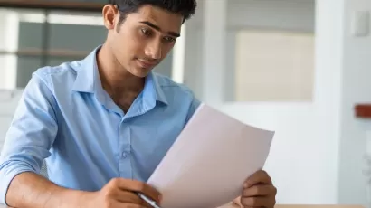 Student filling out an application form
