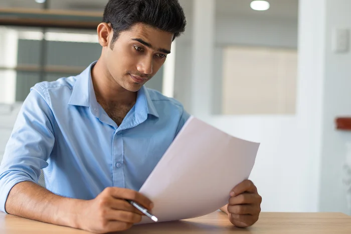 Student filling out an application form